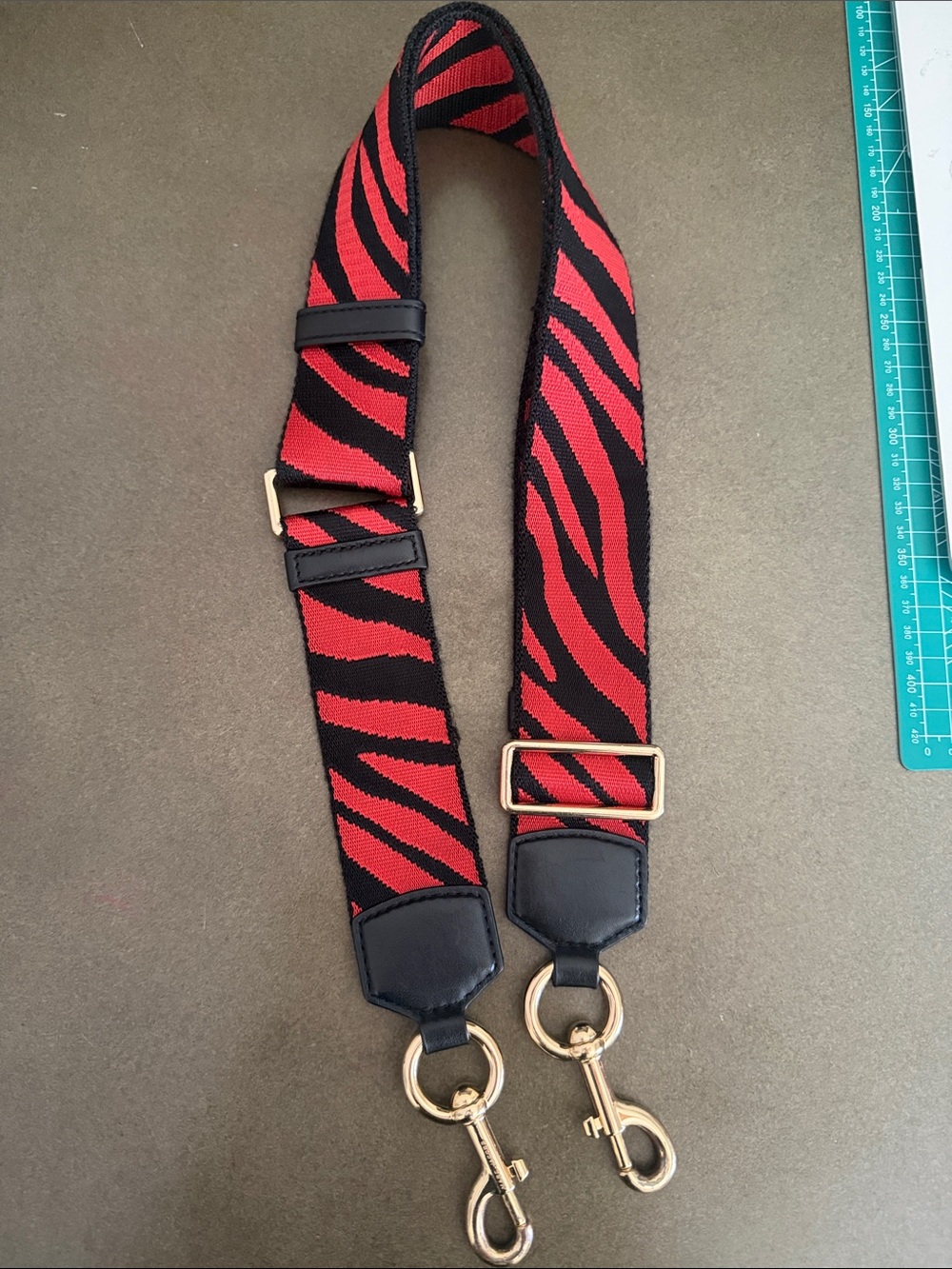 Marc Jacobs Black Leather Strap with Red & Black Woven Stripe and Gold Hardware - Picture 2 of 3